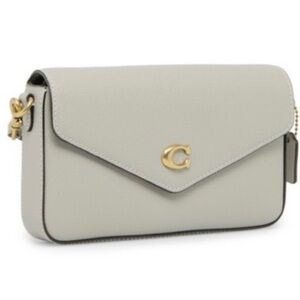 White coach crossbody purse with gold hardware